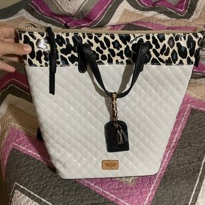 Consuela carry all back back wedge purse